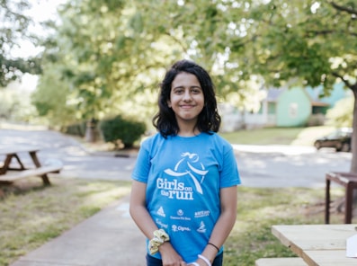 Girls on the Run participant smiles outdoors 
